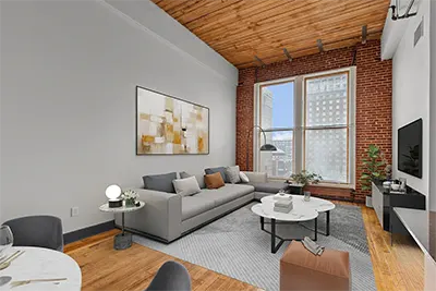 Loft-style apartment living room with city view in Downtown St. Louis, MO