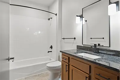 Modern upgraded private bathroom in Six Cord Apartments