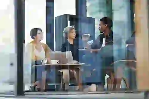 Group of people meeting in conference room