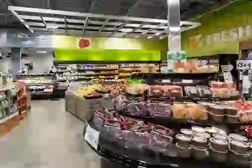 Wide shot of aisles and shopping at CVS Pharmacy
