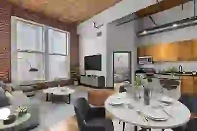 Open-concept floor-plan with kitchen and living room leading to large windows with natural light and downtown city views