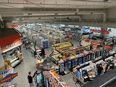 Wide shot of aisles and shopping at CVS Pharmacy