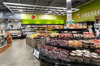 Wide shot of aisles and shopping at CVS Pharmacy